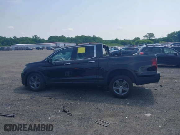 2023 Honda Ridgeline RTL-E with VIN 5FPYK3F71PB022739, listed as a IAAI auction lot 42447428 with 19,702 mi miles and . Bid and sale history available at DreamBid. Image 14.