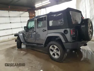 2018 Jeep Wrangler JK Unlimited Sahara with VIN 1C4HJWEG2JL848115, listed as a Copart auction lot 80292624 with 72,591 mi miles and Salvage Title. Bid and sale history available at carsss.com. Image 2.