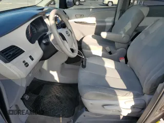 2012 Toyota Sienna with VIN 5TDKA3DC6CS010187, listed as a Copart auction lot 86885234 with 145,745 mi miles and Salvage Title. Bid and sale history available at DreamBid. Image 7.
