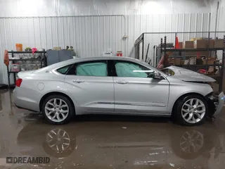 2018 Chevrolet Impala Premier with VIN 2G1125S36J9138869, listed as a IAAI auction lot 41207086 with 218,327 mi miles. Bid and sale history available at carsss.com. Image 14.