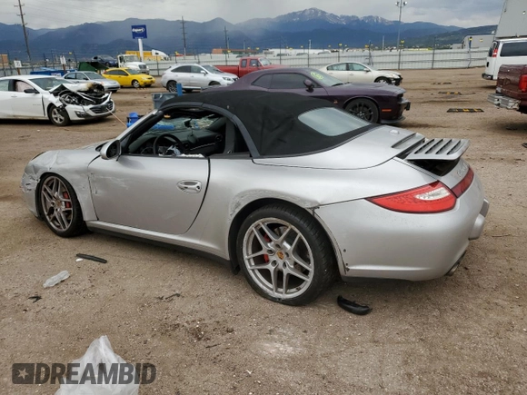 2009 Porsche 911 Carrera S with VIN WP0CB29919S755552, listed as a Copart auction lot 59403325 with 57,990 mi miles and Salvage title. Bid and sale history available at DreamBid. Image 2.