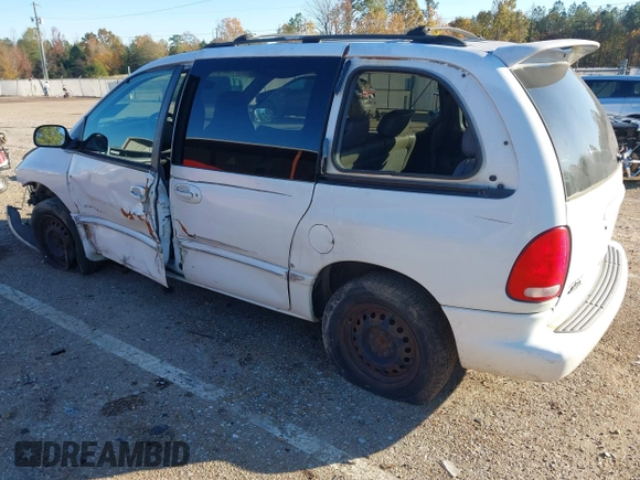 1999 Dodge Caravan SE with VIN 2B4GP45G0XR312100, listed as a IAAI auction lot 40966771 with 233,188 mi miles and . Bid and sale history available at carsss.com. Image 3.