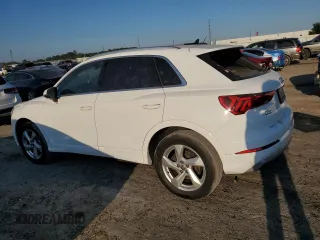 2019 Audi Q3 Premium with VIN WA1AECF38K1076355, listed as a Copart auction lot 74242994 with 86,594 mi miles and Salvage Title. Bid and sale history available at carsss.com. Image 2.