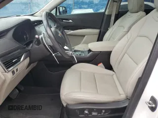 2023 Cadillac XT4 FWD Premium Luxury z VIN 1GYFZCR44PF105116, wystawiony jako Copart lot #51945915 z przebiegiem 20 669 mil mil oraz Szkoda całkowita • Salvage title. Historia ofert i sprzedaży dostępna na DreamBid. Obrazek 7.