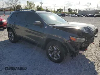 2019 Jeep Cherokee Trailhawk with VIN 1C4PJMBX9KD183343, listed as a Copart auction lot 48662565 with 77,988 mi miles and Non repairable. Bid and sale history available at DreamBid. Image 4.