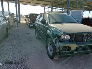 2000 Mitsubishi Montero LS z VIN JA4MT31H0YP015030, wystawiony jako Copart lot #83232584 z przebiegiem 75 294 mil mil oraz Szkoda całkowita • Salvage title. Historia ofert i sprzedaży dostępna na DreamBid. Obrazek 10.