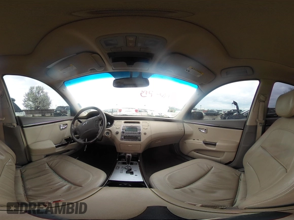 2009 Hyundai Azera Limited z VIN KMHFC46FX9A343230, wystawiony jako IAAI lot #42107823 z przebiegiem 26 319 mil mil oraz . Historia ofert i sprzedaży dostępna na DreamBid. Obrazek 19.