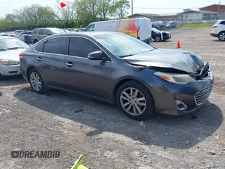 2014 Toyota Avalon Limited with VIN 4T1BK1EB3EU087911, listed as a IAAI auction lot 42070580 with 191,687 mi miles. Bid and sale history available at carsss.com. Image 13.