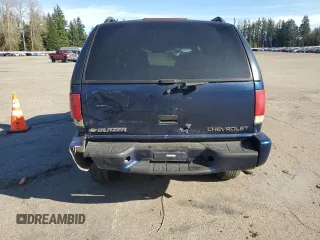 2000 Chevrolet Blazer LT z VIN 1GNDT13W8Y2119632, wystawiony jako Copart lot #47387175 z przebiegiem 140 356 mil mil oraz Szkoda całkowita • Salvage title. Historia ofert i sprzedaży dostępna na DreamBid. Obrazek 6.