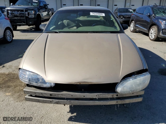 1999 Chevrolet Lumina with VIN 2G1WL52M8X9179556, listed as a Copart auction lot 74234804 with NaN miles and Salvage Title. Bid and sale history available at carsss.com. Image 5.
