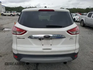 2013 Ford Escape SEL z VIN 1FMCU9HX4DUB05173, wystawiony jako Copart lot #57918125 z przebiegiem 197 195 mil mil oraz Szkoda całkowita • Salvage title. Historia ofert i sprzedaży dostępna na DreamBid. Obrazek 6.