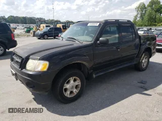 2004 Ford Explorer Sport Trac XLS z VIN 1FMZU77K64UB25123, wystawiony jako Copart lot #54880035 z przebiegiem 289 587 mil mil oraz Czysty tytuł • Clean title. Historia ofert i sprzedaży dostępna na DreamBid. Obrazek 1.