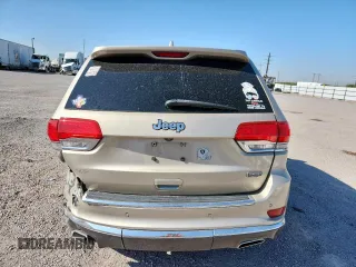 2015 Jeep Grand Cherokee Summit with VIN 1C4RJEJG9FC952192, listed as a Copart auction lot 63714045 with 147,732 mi miles and Salvage title. Bid and sale history available at DreamBid. Image 6.