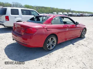 2014 BMW 4 Series 428i xDrive with VIN WBA3T1C56EPS98728, listed as a IAAI auction lot 42092079 with 102,856 mi miles and . Bid and sale history available at carsss.com. Image 4.