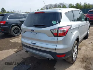 2017 Ford Escape SE with VIN 1FMCU9G95HUA10906, listed as a IAAI auction lot 41841566 with 132,777 mi miles. Bid and sale history available at carsss.com. Image 4.