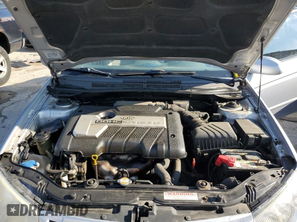2006 Kia Spectra EX z VIN KNAFE121565370909, wystawiony jako Copart lot #56572995 z przebiegiem 102 978 mil mil oraz Szkoda całkowita • Salvage title. Historia ofert i sprzedaży dostępna na DreamBid. Obrazek 11.