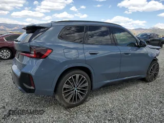 2023 BMW X1 xDrive28i z VIN WBX73EF00P5W09504, wystawiony jako Copart lot #51855325 z przebiegiem 37 759 mil mil oraz Szkoda całkowita • Salvage title. Historia ofert i sprzedaży dostępna na DreamBid. Obrazek 3.
