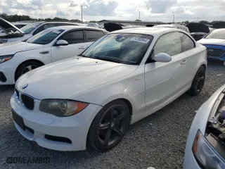 2009 BMW 1 Series 135i with VIN WBAUC73509VK94795, listed as a Copart auction lot 74760544 with 0 mi miles and Salvage Title. Bid and sale history available at carsss.com. Image 1.