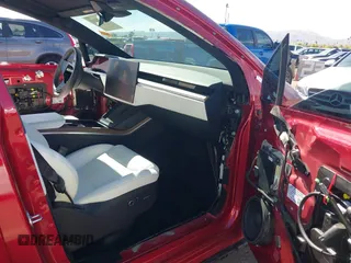 2023 Tesla Model X with VIN 7SAXCBE52PF416278, listed as a IAAI auction lot 42066747 with Not Provided miles and . Bid and sale history available at DreamBid. Image 5.