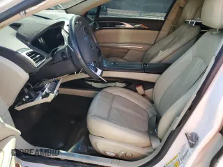 2014 Lincoln MKZ z VIN 3LN6L2G91ER820544, wystawiony jako Copart lot #56049535 z przebiegiem 211 323 mil mil oraz Szkoda całkowita • Salvage title. Historia ofert i sprzedaży dostępna na DreamBid. Obrazek 7.