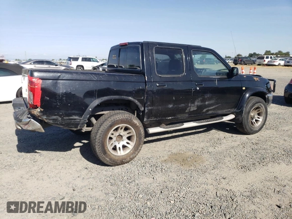 2000 Nissan Frontier XE z VIN 1N6ED27Y3YC324102, wystawiony jako Copart lot #56922155 z przebiegiem 202 233 mil mil oraz Szkoda całkowita • Salvage title. Historia ofert i sprzedaży dostępna na DreamBid. Obrazek 3.