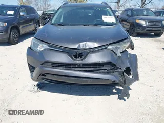 2016 Toyota RAV4 LE with VIN 2T3BFREV6GW482446, listed as a IAAI auction lot 41879439 with 144,693 mi miles. Bid and sale history available at carsss.com. Image 6.