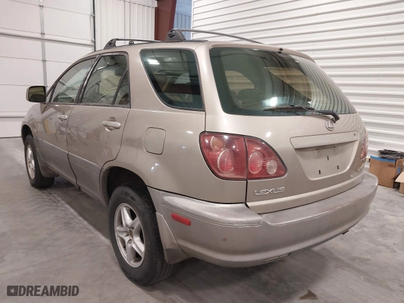 1999 Lexus RX 300 Luxury SUV with VIN JT6HF10U1X0013464, listed as a IAAI auction lot 42088616 with 254,653 mi miles. Bid and sale history available at carsss.com. Image 3.
