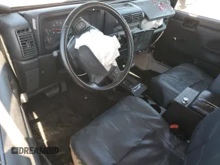 2003 Jeep Wrangler X with VIN 1J4FA39S13P311214, listed as a Copart auction lot 57345175 with 75,088 mi miles and Salvage title. Bid and sale history available at DreamBid. Image 8.