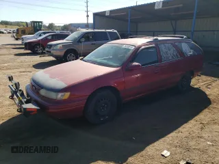 1995 Ford Taurus GL z VIN 1FALP57U8SG189639, wystawiony jako Copart lot #75658974 z przebiegiem 165 788 mil mil oraz Czysty tytuł • Clean title. Historia ofert i sprzedaży dostępna na DreamBid. Obrazek 1.
