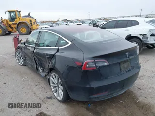 2018 Tesla Model 3 Long Range Battery with VIN 5YJ3E1EB9JF188437, listed as a IAAI auction lot 41371254 with 55,934 mi miles and . Bid and sale history available at DreamBid. Image 3.