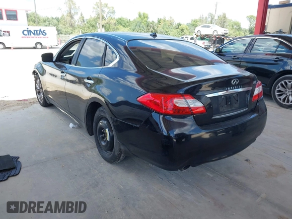2012 Infiniti M with VIN JN1BY1AP1CM335867, listed as a IAAI auction lot 42169743 with 148,650 mi miles and . Bid and sale history available at DreamBid. Image 3.