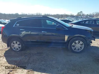 2015 Cadillac SRX with VIN 3GYFNAE35FS608595, listed as a IAAI auction lot 41282751 with 127,055 mi miles and . Bid and sale history available at DreamBid. Image 14.