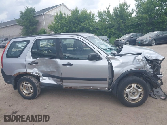 2002 Honda CR-V LX z VIN JHLRD78562C081322, wystawiony jako IAAI lot #42452985 z przebiegiem 193 011 mil mil oraz . Historia ofert i sprzedaży dostępna na DreamBid. Obrazek 14.