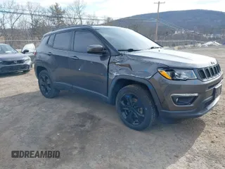 2019 Jeep Compass Latitude with VIN 3C4NJDBB4KT593022, listed as a IAAI auction lot 41627841 with 69,443 mi miles. Bid and sale history available at carsss.com. Image 1.