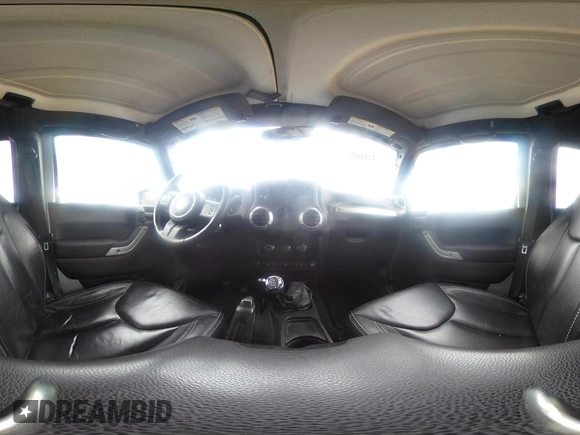 2013 Jeep Wrangler Unlimited Rubicon z VIN 1C4BJWFG7DL667083, wystawiony jako IAAI lot #42016912 z przebiegiem 148 933 mil mil oraz . Historia ofert i sprzedaży dostępna na DreamBid. Obrazek 18.