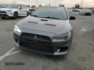 2010 Mitsubishi Lancer Evolution GSR with VIN JA32W8FV1AU027600, listed as a Copart auction lot 84328974 with 88,417 mi miles and Salvage Title. Bid and sale history available at DreamBid. Image 11.