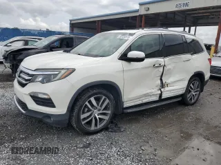 2017 Honda Pilot Touring with VIN 5FNYF6H94HB067379, listed as a Copart auction lot 64109115 with 131,224 mi miles and Salvage title. Bid and sale history available at DreamBid. Image 1.