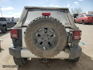 2013 Jeep Wrangler Unlimited Sahara with VIN 1C4BJWEG9DL588029, listed as a Copart auction lot 47665425 with 130,818 mi miles and Salvage Title. Bid and sale history available at carsss.com. Image 6.