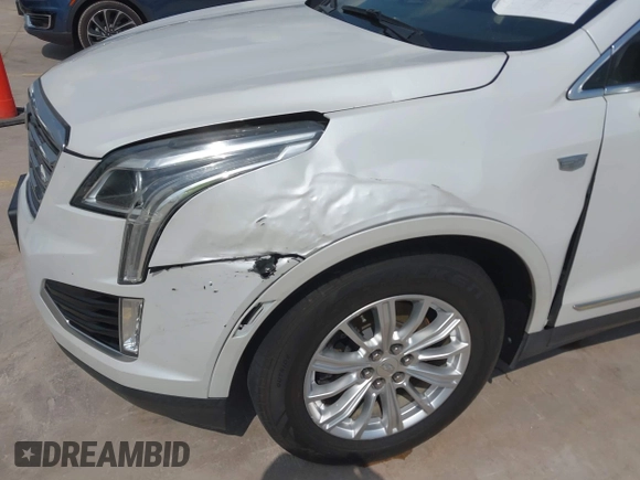 2017 Cadillac XT5 FWD with VIN 1GYKNARS3HZ225471, listed as a IAAI auction lot 42168166 with 149,685 mi miles and . Bid and sale history available at DreamBid. Image 6.