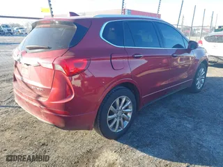 2020 Buick Envision Essence with VIN LRBFXCSA7LD102016, listed as a IAAI auction lot 41306913 with 110,703 mi miles. Bid and sale history available at carsss.com. Image 4.
