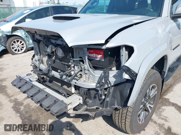 2018 Toyota Tacoma SR with VIN 3TMCZ5AN6JM170128, listed as a IAAI auction lot 42038979 with 59,497 mi miles. Bid and sale history available at carsss.com. Image 6.