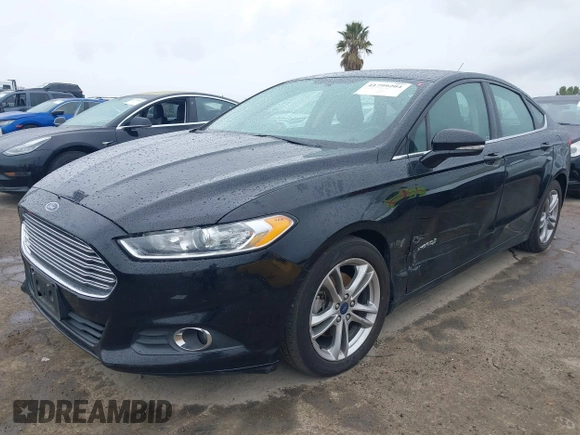 2016 Ford Fusion SE Hybrid with VIN 3FA6P0LU5GR356433, listed as a IAAI auction lot 41799204 with 157,670 mi miles. Bid and sale history available at carsss.com. Image 2.