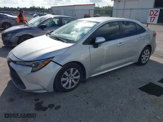 2020 Toyota Corolla LE with VIN JTDEPRAE1LJ112725, listed as a IAAI auction lot 41795210 with 114,439 mi miles. Bid and sale history available at carsss.com. Image 2.