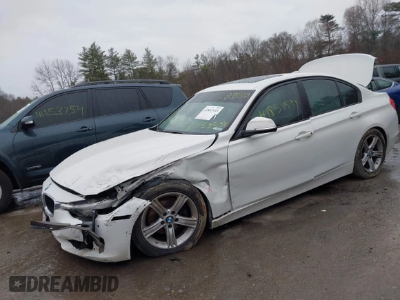 2014 BMW 3 Series 328i xDrive with VIN WBA3B5C56EF599323, listed as a IAAI auction lot 41853533 with 114,358 mi miles. Bid and sale history available at carsss.com. Image 2.