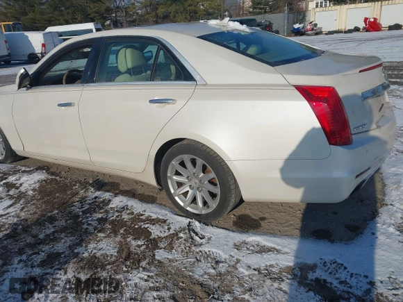 2014 Cadillac CTS Luxury RWD with VIN 1G6AR5SXXE0141931, listed as a IAAI auction lot 41352385 with 162,612 mi miles. Bid and sale history available at carsss.com. Image 3.