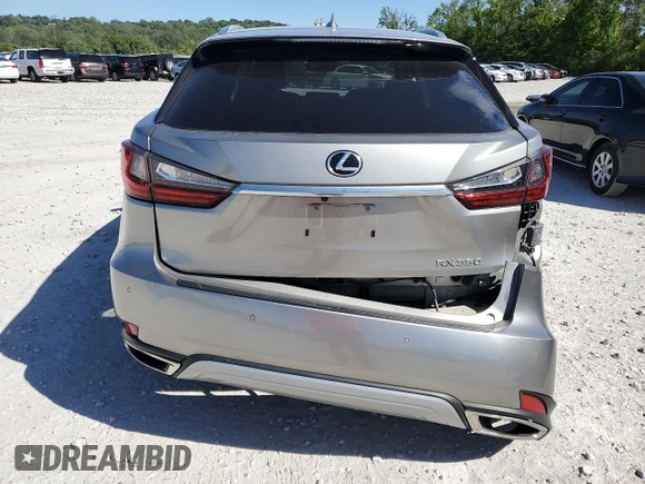 2021 Lexus RX 350 with VIN 2T2HZMDA0MC260229, listed as a Copart auction lot 57242465 with 51,051 mi miles and Salvage title. Bid and sale history available at DreamBid. Image 6.