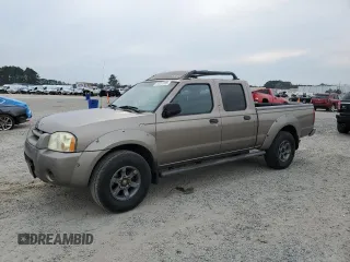 2004 Nissan Frontier XE with VIN 1N6ED29X64C478172, listed as a Copart auction lot 49031985 with 210,354 mi miles and Salvage title. Bid and sale history available at DreamBid. Image 1.