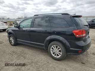 2015 Dodge Journey SXT with VIN 3C4PDCBG9FT690910, listed as a Copart auction lot 48195875 with 110,489 mi miles and Salvage Title. Bid and sale history available at DreamBid. Image 2.