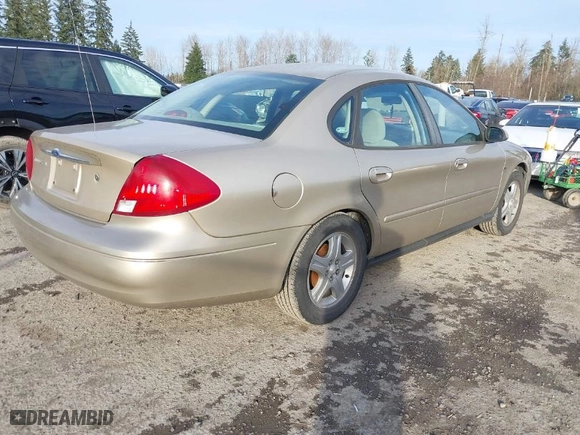 2001 Ford Taurus SEL with VIN 1FAFP56S41G168430, listed as a IAAI auction lot 41675537 with 165,336 mi miles. Bid and sale history available at carsss.com. Image 4.
