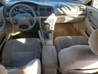 2002 Mazda 626 LX with VIN 1YVGF22C125279863, listed as a Copart auction lot 87103664 with 139,633 mi miles and Salvage Title. Bid and sale history available at carsss.com. Image 8.